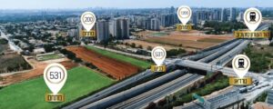 מחלף, כביש מהיר, תחנת רכבת, פיתוח נדלן